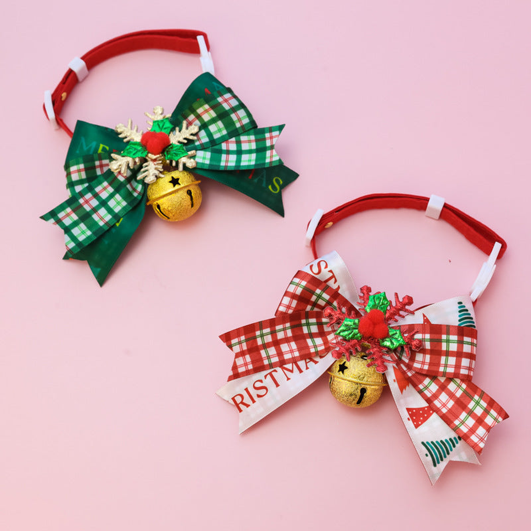 Red Plaid and Green Plaid pet collars arranged diagonally with bows and bells