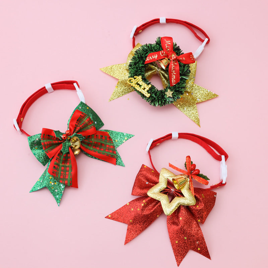 Red, green, and gold pet collar styles displayed together
