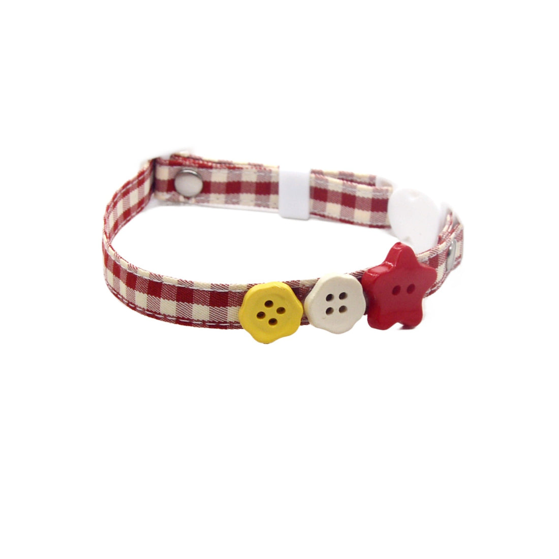 Side view of pink breakaway cat collar showing buckle and charm