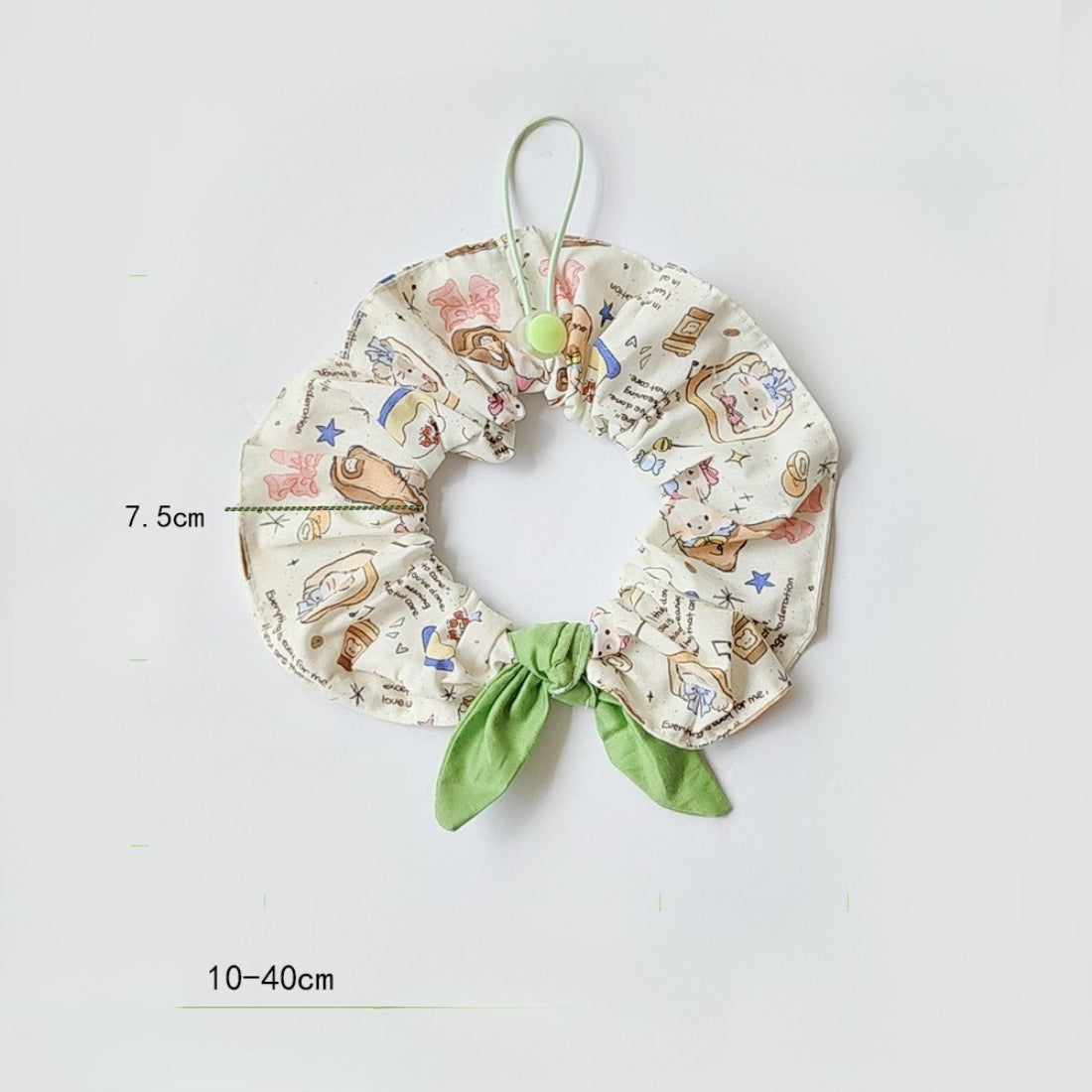 Mokka bib folded to display soft fabric and cat illustration