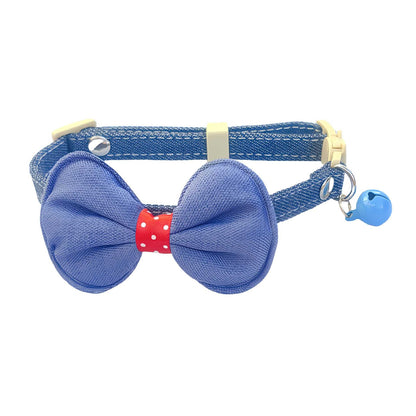 Mokka cat collar with polka dot bow and bell shown from side angle