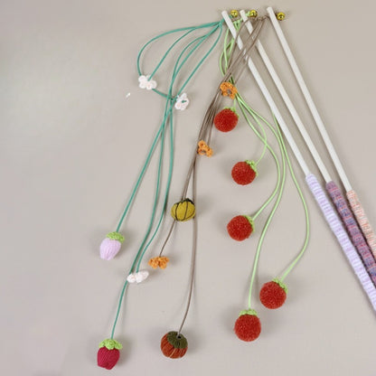 Moo Fruit Wand cat toy with orange pom pom teaser on wooden stick