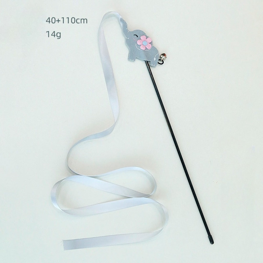 Colorful ribbon wand cat toy with ribbons spread out on a flat surface