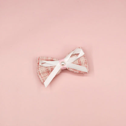 Close-up of sleeve and tweed texture on Ozzie Bow Tweed Cat Top