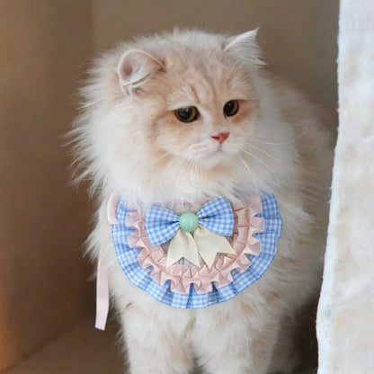 Close-up of Mokka Colourblock Bow Cat Bib highlighting the bow detail