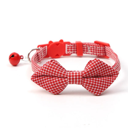 Close-up of Mokka gingham bow tie cat collar showing bell detail