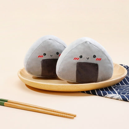 Close-up of Petkin Onigiri Rice Ball plush dog toy showing soft texture and rice ball shape