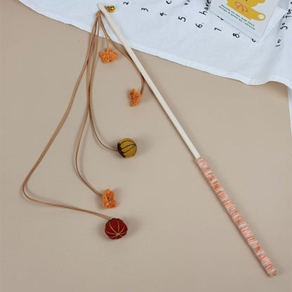 Moo Fruit Wand cat toy showing full length of wooden stick with pom pom