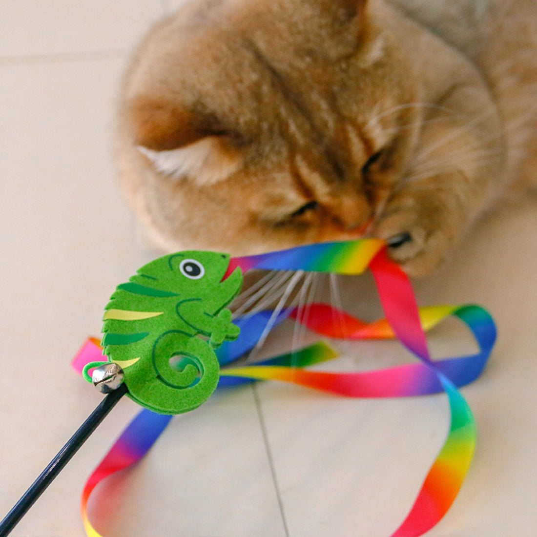 Colorful ribbon wand cat toy with multiple vibrant ribbons attached to a stick