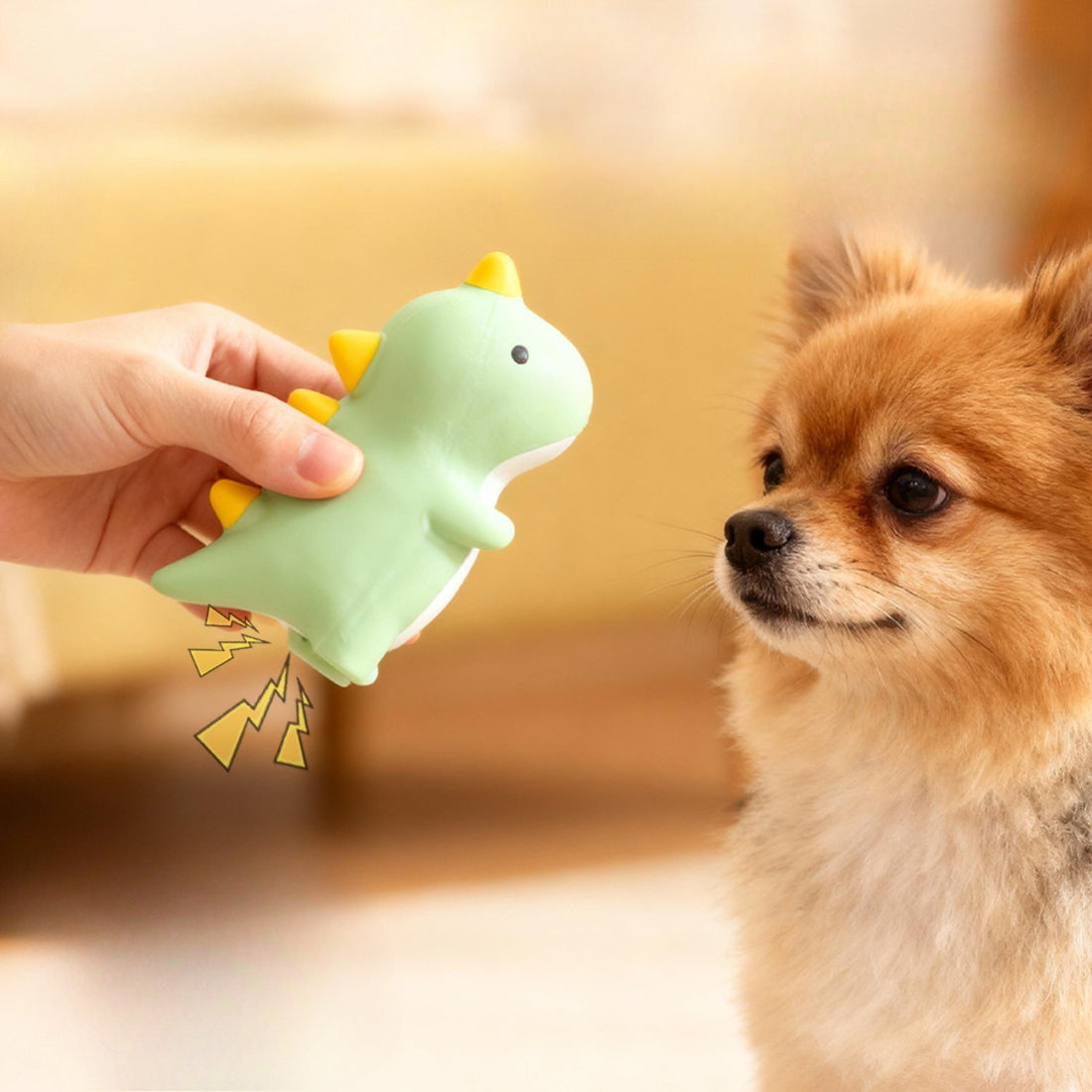 Petkin squeaky dog toy held in hand to show size and texture