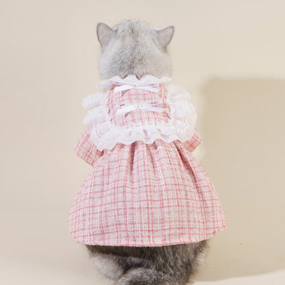 Close-up of bow detail and buttons on Ozzie Bow Tweed Cat Top