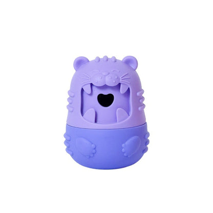Petkin Monster Treat Dispenser dog toy in red with monster face and treat dispensing feature