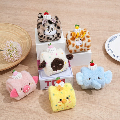 Petkin soft cube dog toy with colorful animal faces on each side