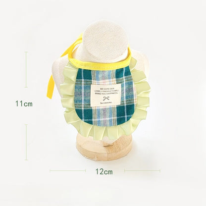 Side view of Mokka plaid ruffle cat bib on a cat showing adjustable strap