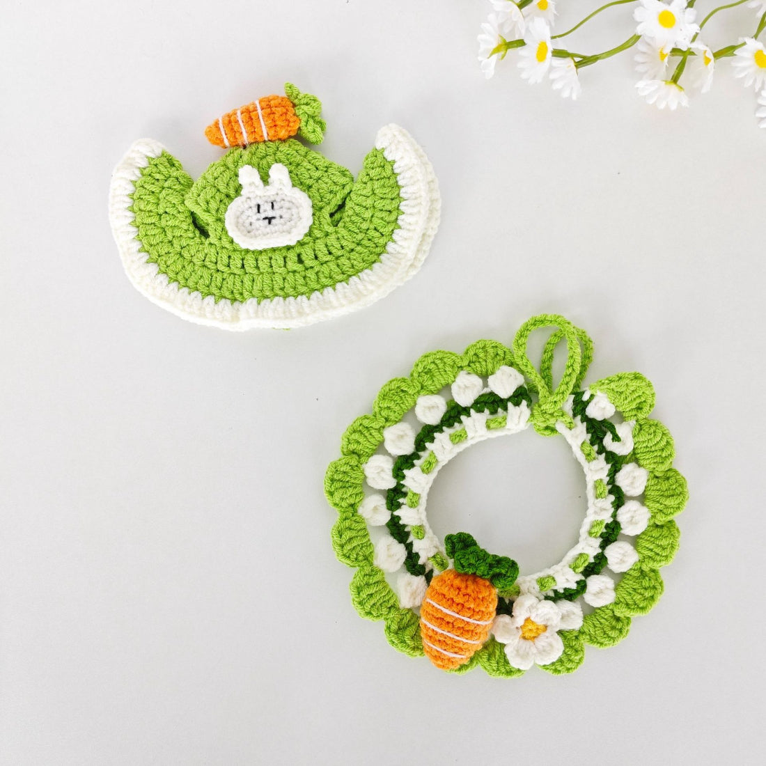 Cat wearing Mokka crochet carrot collar with carrot charm visible on neck