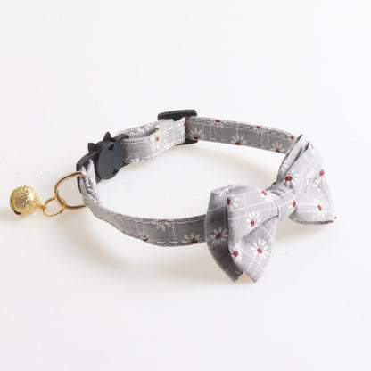 Cat wearing Mokka floral collar styled as a bowtie