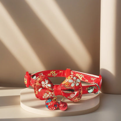Close-up of Mokka Bow Charm Cat Collar showing bow and bell details