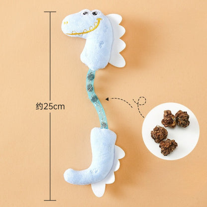 Moo dinosaur plush cat toy standing upright showing side profile and orange spikes