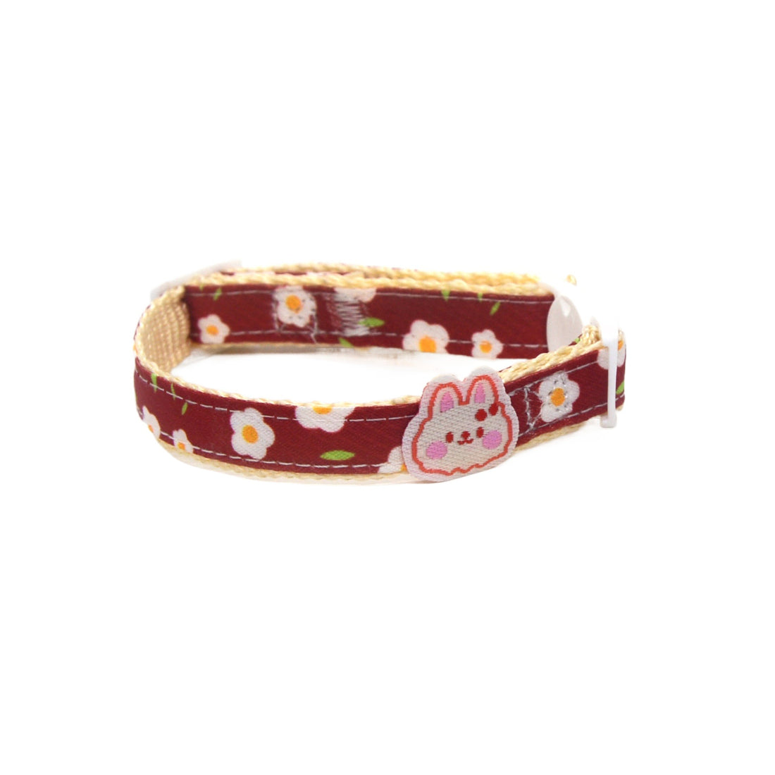 Brown adjustable breakaway cat collar featuring a small white daisy charm