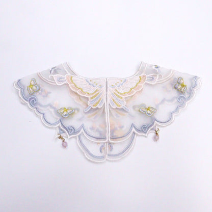 Close-up of Mokka butterfly embroidered cat collar showing detailed butterfly design