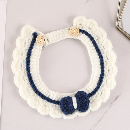 Mokka crochet cat collar with button and bell on a white background