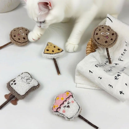 Close-up of Moo plush cat stick toy showing detailed stitching and vibrant colors