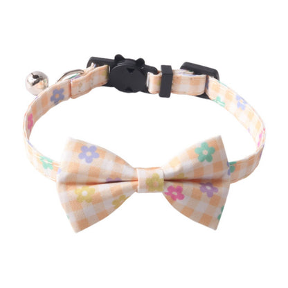 Mokka floral bow tie cat collar showing breakaway safety clasp in open position