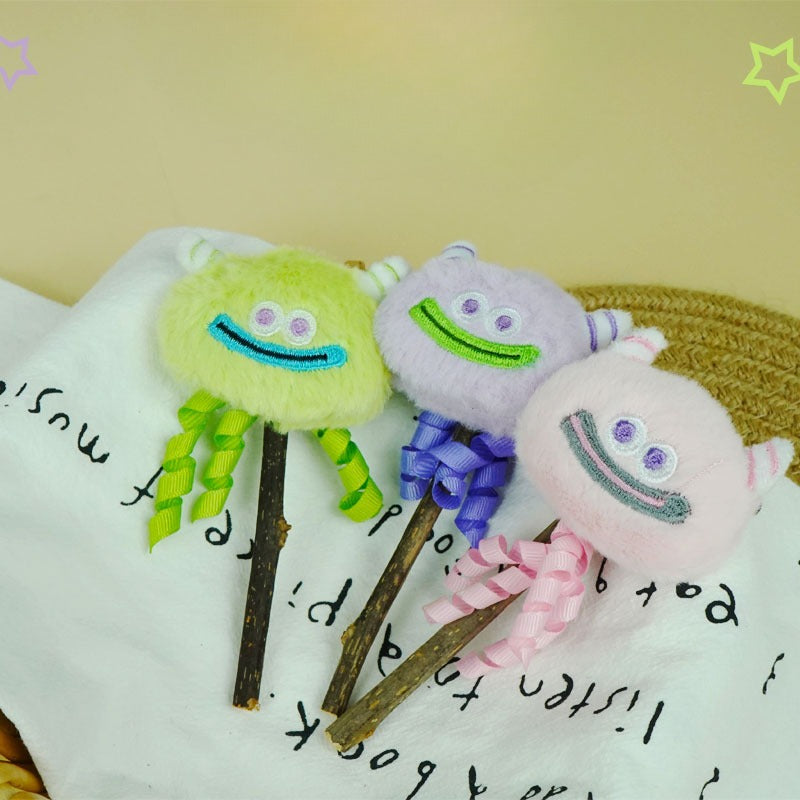 Moo cute monster cat stick toy with colorful monster face and feather attachment