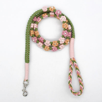 Loofie floral braided dog leash held by hand showing length