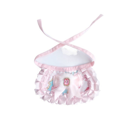 Mokka cat neck bib worn by a cat, showing fit and decorative ruffle with gem