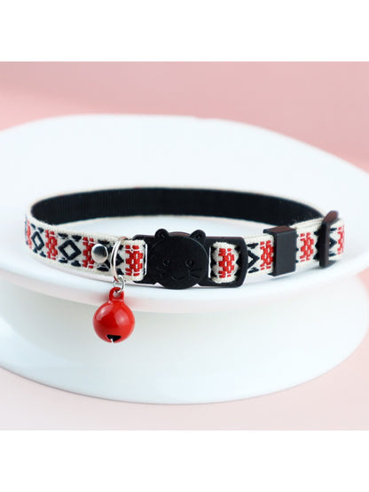 Close-up of metal D-ring on Mokka colorful woven cat collar for attaching tags