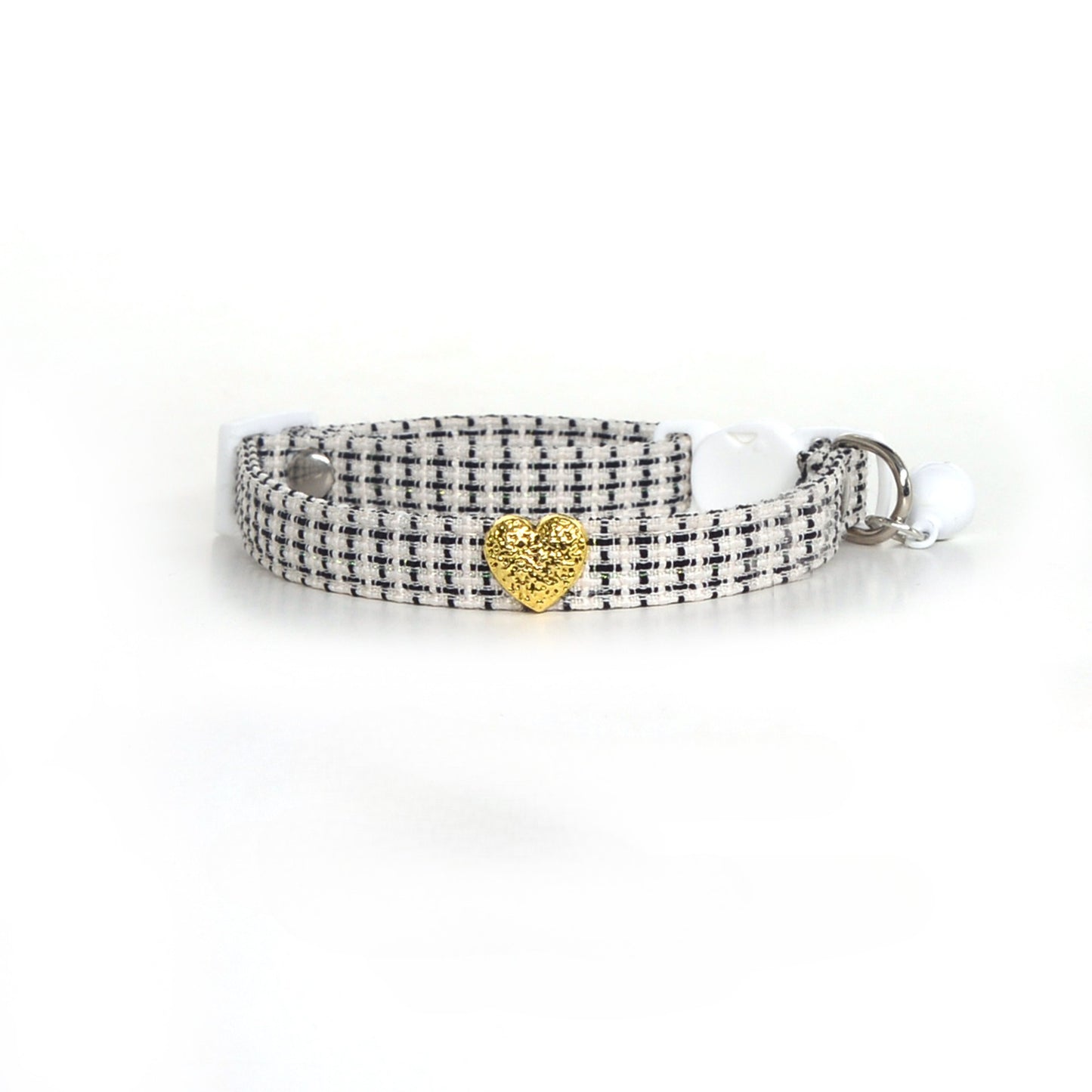 Mokka tweed heart cat collar packaging with collar neatly arranged inside