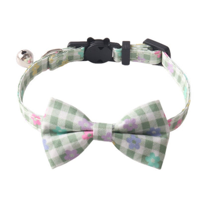 Mokka adjustable cat collar with floral bow tie featuring pink fabric and white flowers