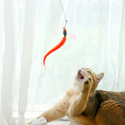 Moo Dragonfly Teaser Cat Wand Toy held by hand with dragonfly attachment visible