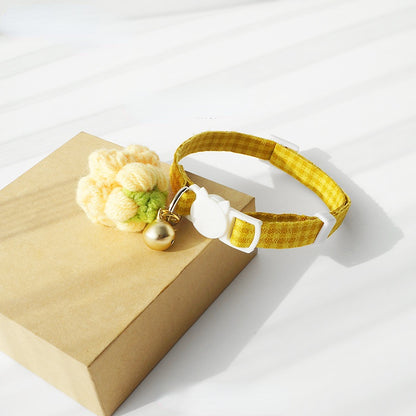Close-up of Mokka cat collar showing grid pattern and adjustable buckle
