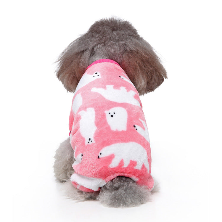 Playful dog enjoying a cozy indoor day in Ozzie Bear Design Dog Pajamas