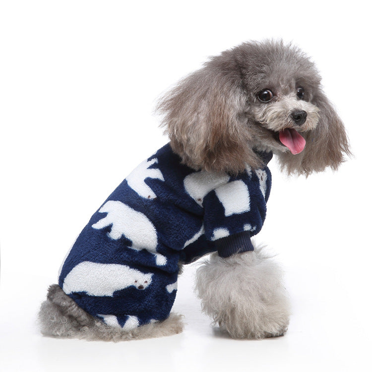 Dog owner holding their pet dressed in Ozzie Bear Design Dog Pajamas, both smiling