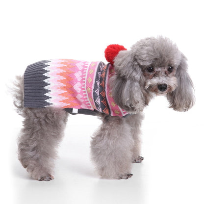 Ozzie soft dog pajamas with hat on dog sitting on carpet