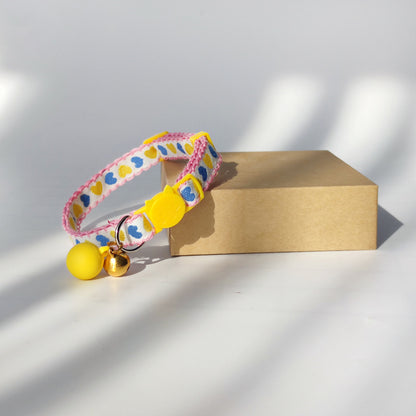 Mokka Valentine themed cat collar displayed flat with heart designs