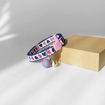 Mokka Valentine themed cat collar worn by a cat with visible heart pattern