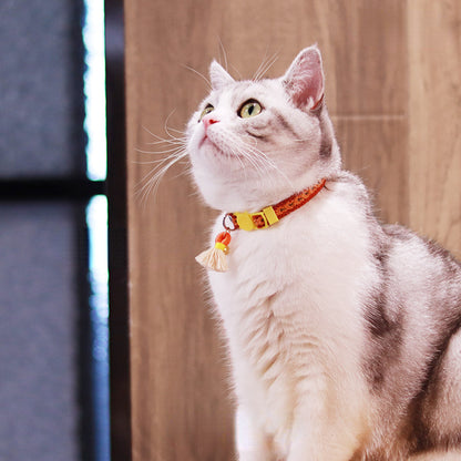 Adorable cat enjoying comfort and style in the Mokka Adjustable Cat Collar with Bell