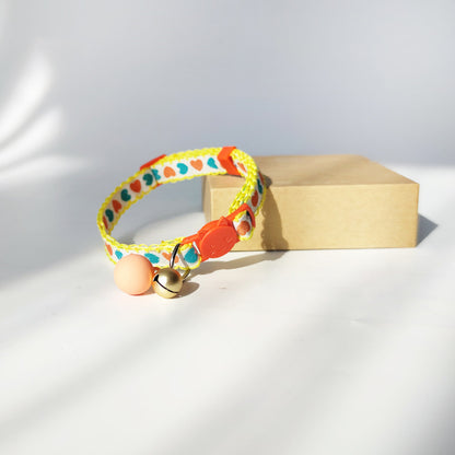 Mokka Valentine themed cat collar with a small bell attached