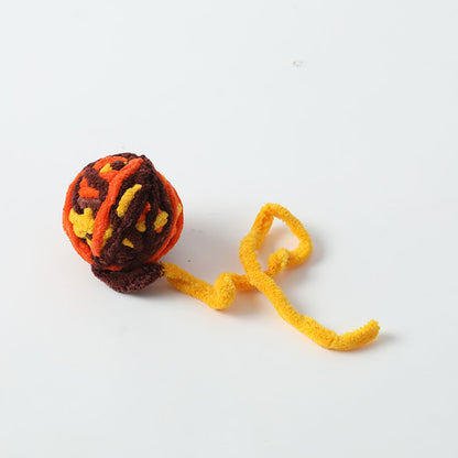 Side view of Moo Cat Toy Ball highlighting its round shape and color pattern
