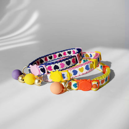 Mokka Valentine themed cat collar with heart pattern on a white background