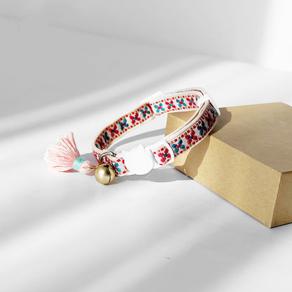 Mokka adjustable cat collar with bell displayed to show D-ring and webbing