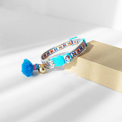 Mokka adjustable cat collar with bell laid flat showing buckle and bell