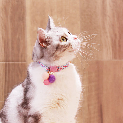 Mokka cat collar with bell and hardware detail on white background