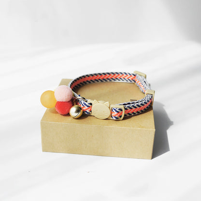 Mokka adjustable cat collar with bell arranged to show length and hardware