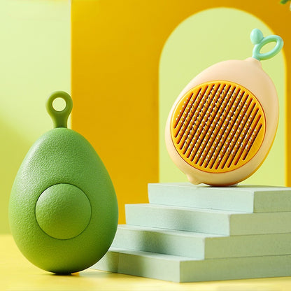 Ruffle Avocado Pet Brush on a white background