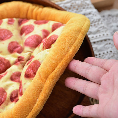 Close-up of the Petkin Pizza Dog Toy fabric and stitching